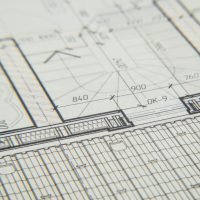 Close-up of an architectural blueprint showcasing intricate design details for a building layout.